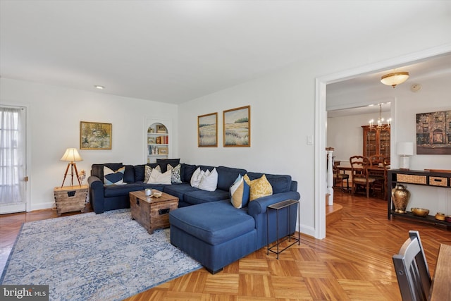 1417 Dorset Ln, Wynnewood, PA 19096 - living area with a chandelier and baseboards