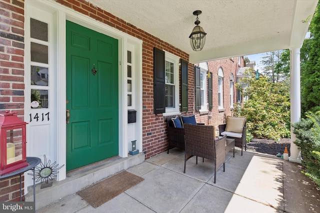 1417 Dorset Ln, Wynnewood, PA 19096 - property entrance featuring brick siding and a porch