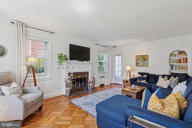 1417 Dorset Ln, Wynnewood, PA 19096 - living room with radiator heating unit and a fireplace