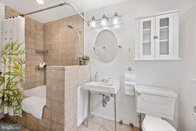1915 16th St NW Unit 203, Washington, DC 20009 - bathroom with toilet and tile patterned flooring