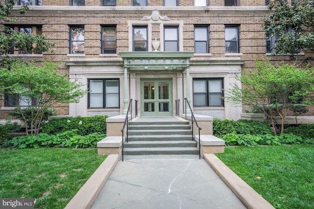 1915 16th St NW Unit 203, Washington, DC 20009 - view of exterior entry with brick siding and french doors