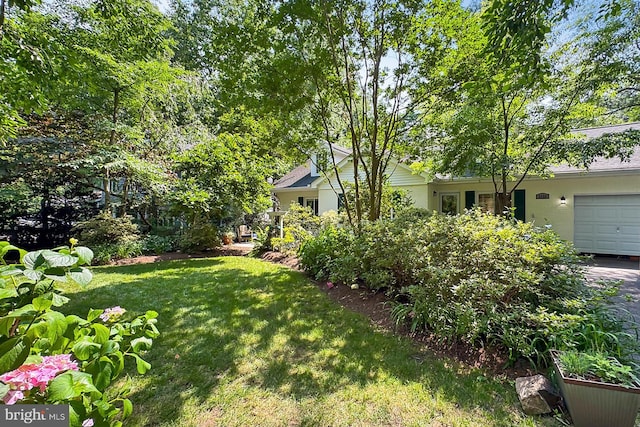 3132 Holmes Run Rd, Falls Church, VA 22042 - view of grassy yard with an attached garage