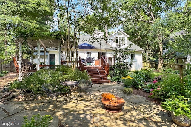 3132 Holmes Run Rd, Falls Church, VA 22042 - view of front of home with stairs, a patio, a deck, and a shingled roof