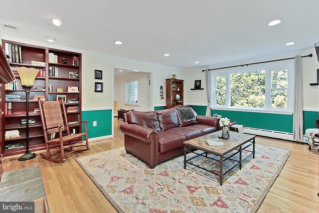 3132 Holmes Run Rd, Falls Church, VA 22042 - living room featuring plenty of natural light, wood finished floors, recessed lighting, crown molding, and a baseboard radiator