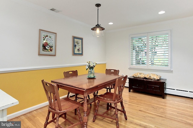3132 Holmes Run Rd, Falls Church, VA 22042 - dining area featuring light wood-style flooring, crown molding, recessed lighting, and a baseboard heating unit