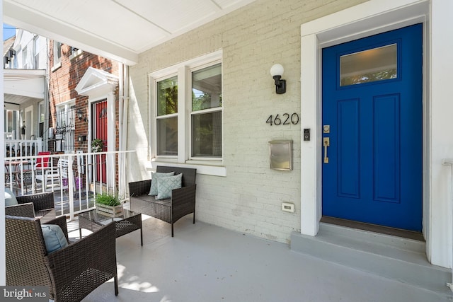 4620 4th St NW, Washington, DC 20011 - view of exterior entry featuring brick siding and a porch