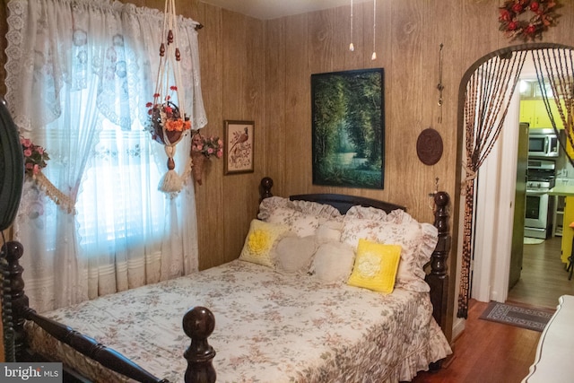 526 S Carlin Springs Rd, Arlington, VA 22204 - bedroom with wood finished floors and wooden walls