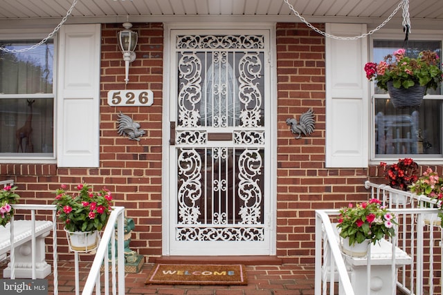 526 S Carlin Springs Rd, Arlington, VA 22204 - property entrance with a porch and brick siding
