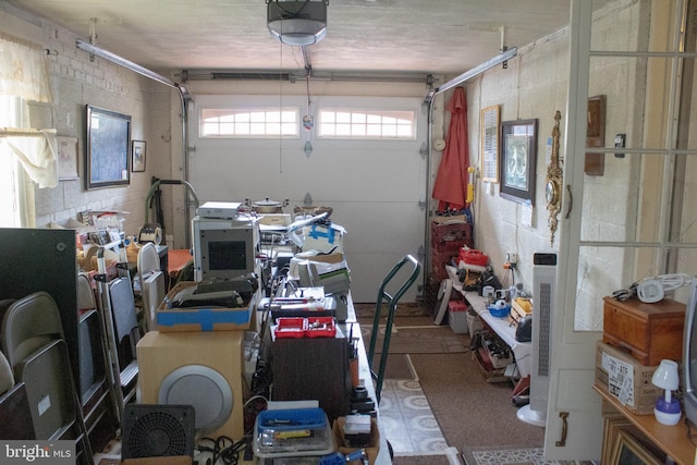 526 S Carlin Springs Rd, Arlington, VA 22204 - garage with a garage door opener, concrete block wall, and a workshop area