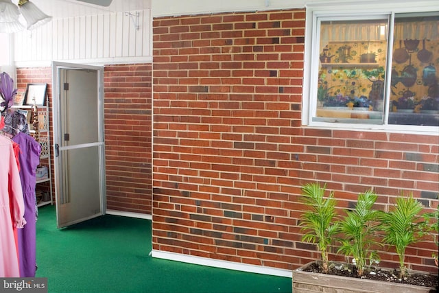 526 S Carlin Springs Rd, Arlington, VA 22204 - detailed view of brick wall, carpet, and ceiling fan