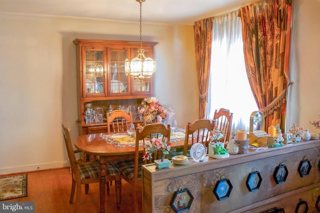 526 S Carlin Springs Rd, Arlington, VA 22204 - dining room featuring a chandelier, wood finished floors, and ornamental molding