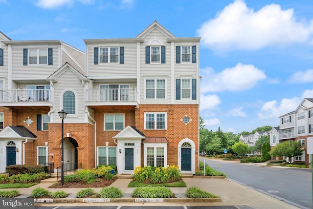 5800 Katelyn Mary Pl Unit 5800, Alexandria, VA 22310 - view of property with brick siding and a residential view