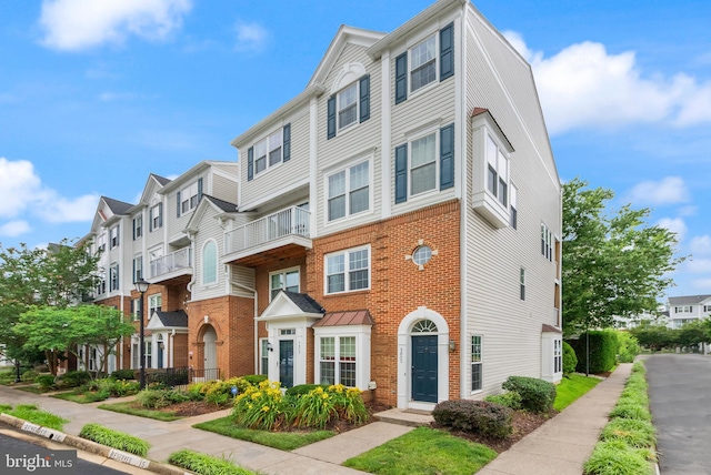 5800 Katelyn Mary Pl Unit 5800, Alexandria, VA 22310 - view of front of home featuring brick siding and a residential view