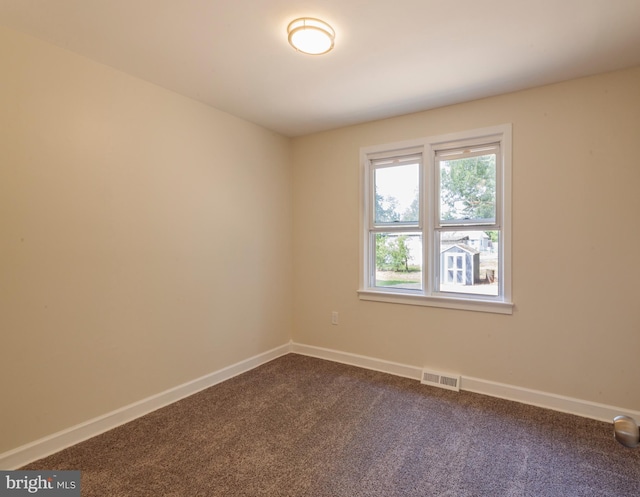 7 Flag St, Pemberton, NJ 08068 - empty room featuring dark colored carpet and baseboards