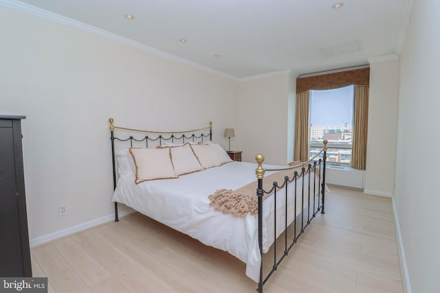 1435 4th St SW Unit B815, Washington, DC 20024 - bedroom with light wood-style floors, crown molding, and recessed lighting