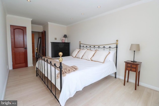 1435 4th St SW Unit B815, Washington, DC 20024 - bedroom with light wood-style floors, ornamental molding, and recessed lighting