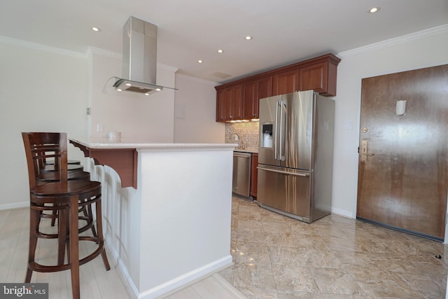 1435 4th St SW Unit B815, Washington, DC 20024 - kitchen with stainless steel appliances, island exhaust hood, crown molding, light countertops, and backsplash