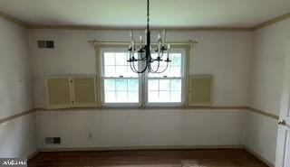 1219 Piney Hill Rd, Monkton, MD 21111 - unfurnished dining area with a chandelier and ornamental molding