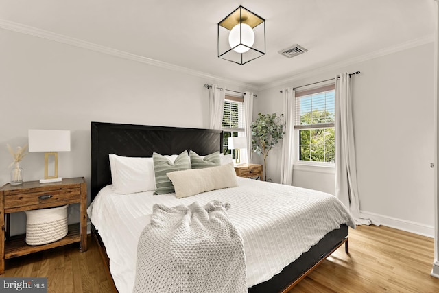 110 E Nelson Ave, Alexandria, VA 22301 - bedroom featuring ornamental molding and wood finished floors