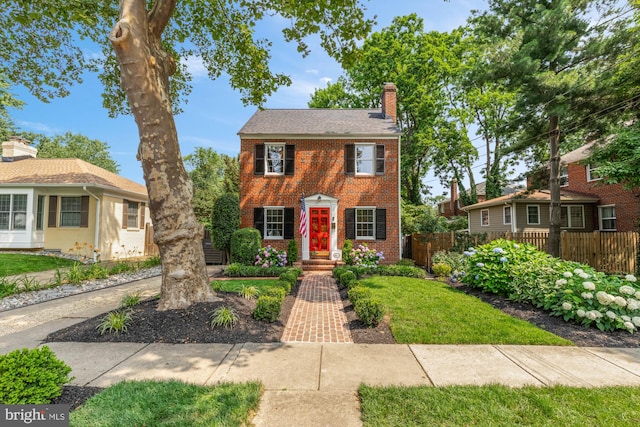 110 E Nelson Ave, Alexandria, VA 22301 - view of front facade with brick siding and a chimney