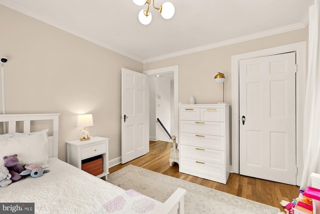 110 E Nelson Ave, Alexandria, VA 22301 - bedroom with crown molding, wood finished floors, and a chandelier