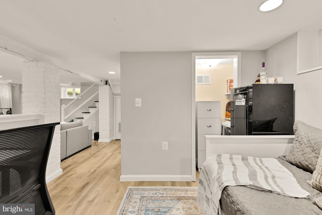 110 E Nelson Ave, Alexandria, VA 22301 - bedroom featuring light wood-style flooring, recessed lighting, and decorative columns