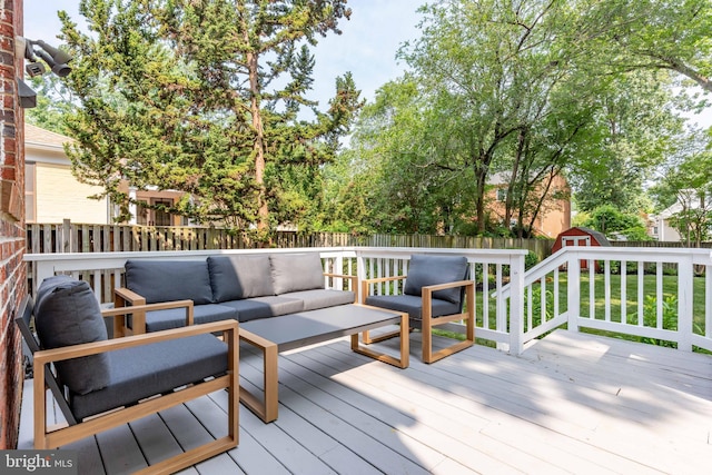 110 E Nelson Ave, Alexandria, VA 22301 - wooden terrace with outdoor lounge area, a shed, and a fenced backyard