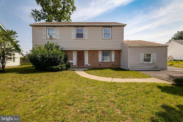 18 Bendix Ln, Willingboro, NJ 08046 - colonial inspired home featuring a front yard and brick siding