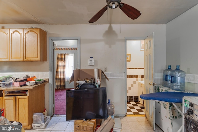 18 Bendix Ln, Willingboro, NJ 08046 - kitchen with light brown cabinets, a ceiling fan, light tile patterned floors, a wainscoted wall, and light countertops