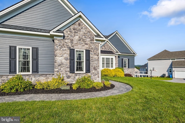 211 Hauer Ter, Spring Grove, PA 17362 - view of front of property featuring stone siding and a front yard