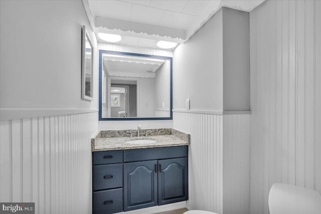 324 W Clayton Ave, Clayton, NJ 08312 - bathroom featuring a wainscoted wall and vanity