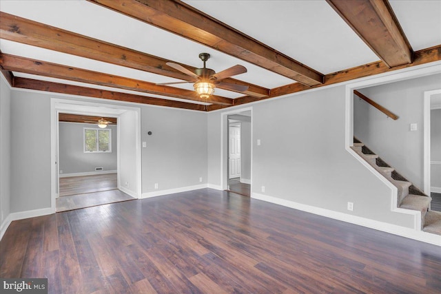 324 W Clayton Ave, Clayton, NJ 08312 - unfurnished living room with a ceiling fan, wood finished floors, beam ceiling, and stairway