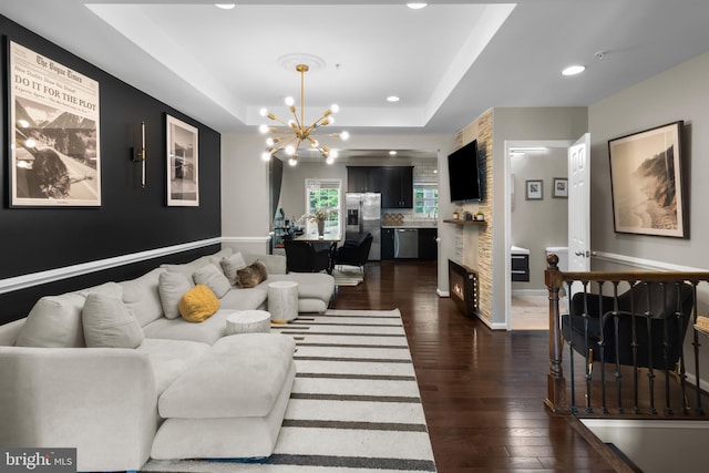 1778 W St SE, Washington, DC 20020 - living area with a chandelier, dark wood-style floors, recessed lighting, and a raised ceiling
