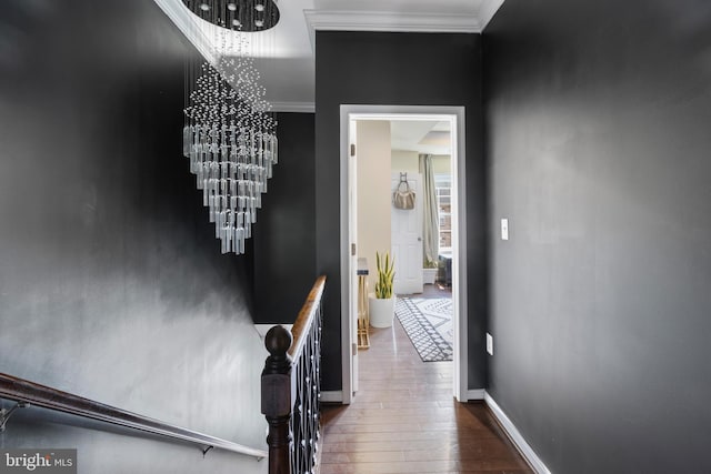 1778 W St SE, Washington, DC 20020 - stairs with a chandelier, wood-type flooring, and ornamental molding