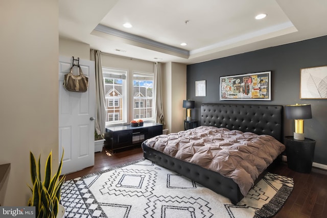 1778 W St SE, Washington, DC 20020 - bedroom with wood finished floors, a tray ceiling, and recessed lighting