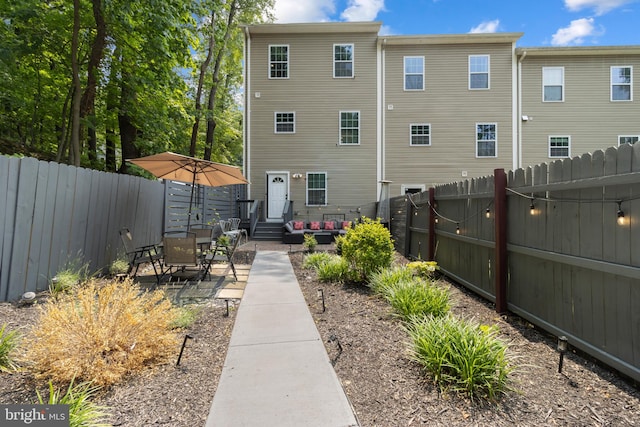 1778 W St SE, Washington, DC 20020 - back of property featuring a fenced backyard and a patio area
