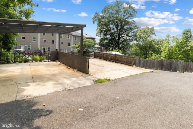 1778 W St SE, Washington, DC 20020 - view of patio / terrace featuring a fenced front yard, a detached carport, and a gate
