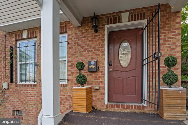 1778 W St SE, Washington, DC 20020 - doorway to property with brick siding and a porch
