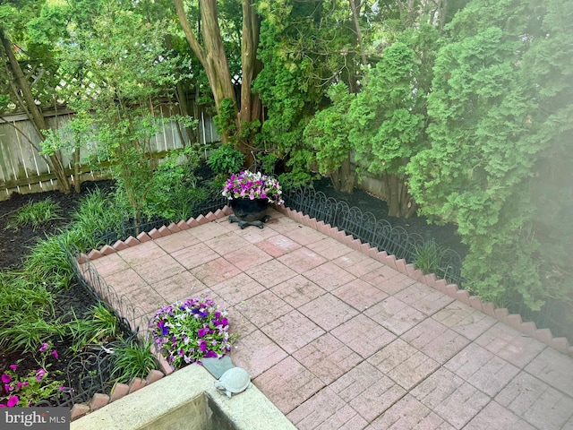 3822 Benton St NW, Washington, DC 20007 - fenced backyard featuring a patio area