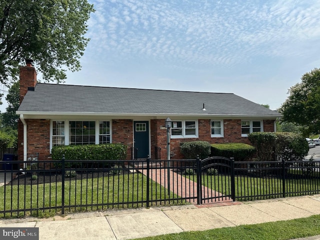 6087 8th Pl N, Arlington, VA 22205 - view of front of house featuring brick siding, a fenced front yard, and a chimney