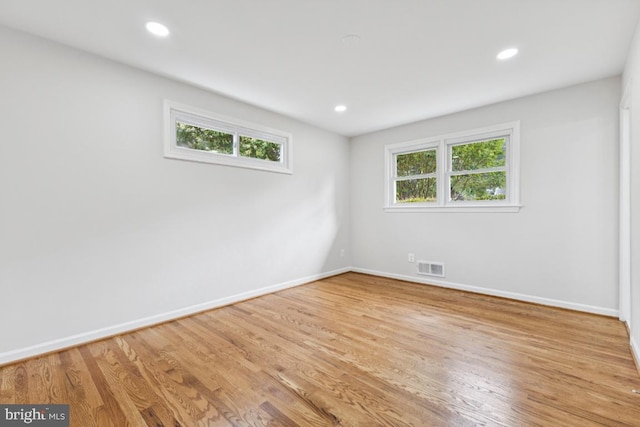 6087 8th Pl N, Arlington, VA 22205 - empty room featuring light wood-type flooring and recessed lighting