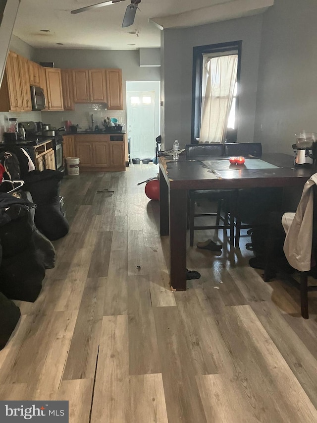 2118 S Shields St, Philadelphia, PA 19142 - dining space with wood finished floors and a ceiling fan