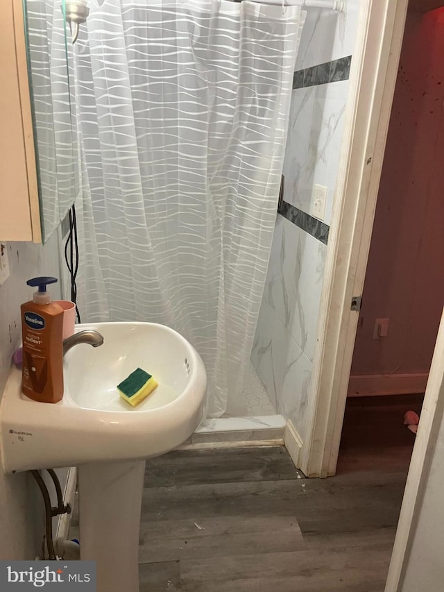 2118 S Shields St, Philadelphia, PA 19142 - full bath featuring a stall shower and wood finished floors