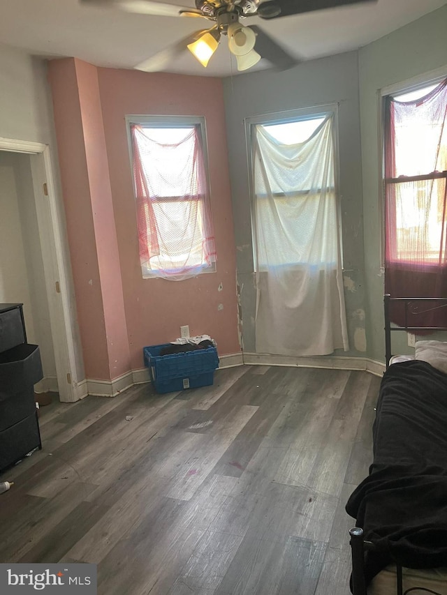 2118 S Shields St, Philadelphia, PA 19142 - unfurnished dining area featuring a ceiling fan, healthy amount of natural light, and wood finished floors