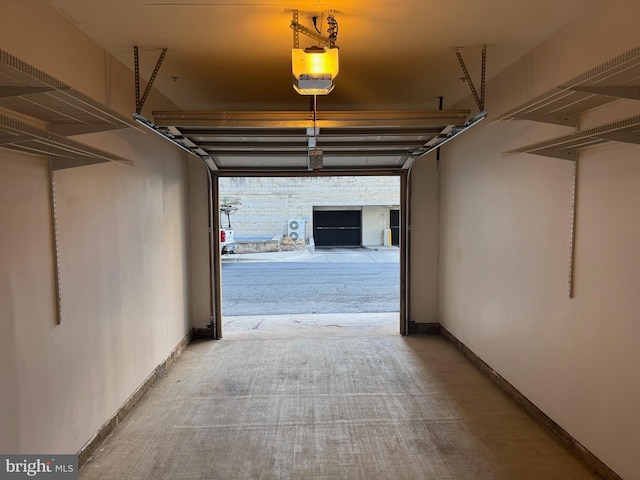 11750 Old Georgetown Unit 2524, Rockville, MD 20852 - garage with a garage door opener and baseboards