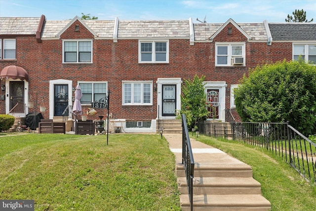 1319 E Vernon Rd, Philadelphia, PA 19150 - view of property with entry steps, brick siding, and a high end roof