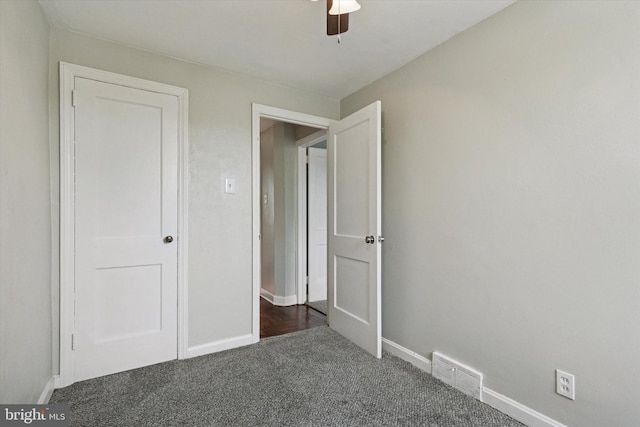 1319 E Vernon Rd, Philadelphia, PA 19150 - unfurnished bedroom featuring dark colored carpet and a ceiling fan