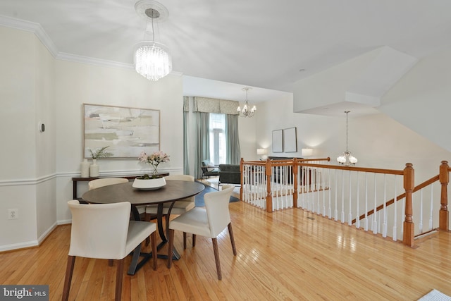 440 Clayton Ln, Alexandria, VA 22304 - dining room featuring a chandelier, wood-type flooring, and crown molding