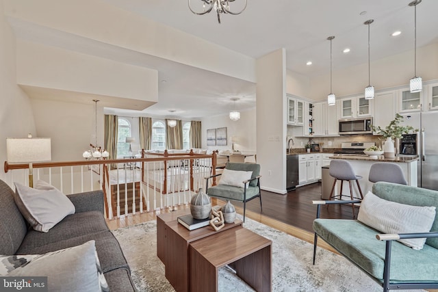 440 Clayton Ln, Alexandria, VA 22304 - living area with a chandelier, dark wood-style flooring, and recessed lighting