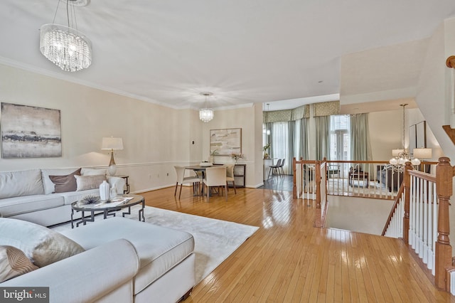 440 Clayton Ln, Alexandria, VA 22304 - living room with a chandelier, hardwood / wood-style floors, and crown molding